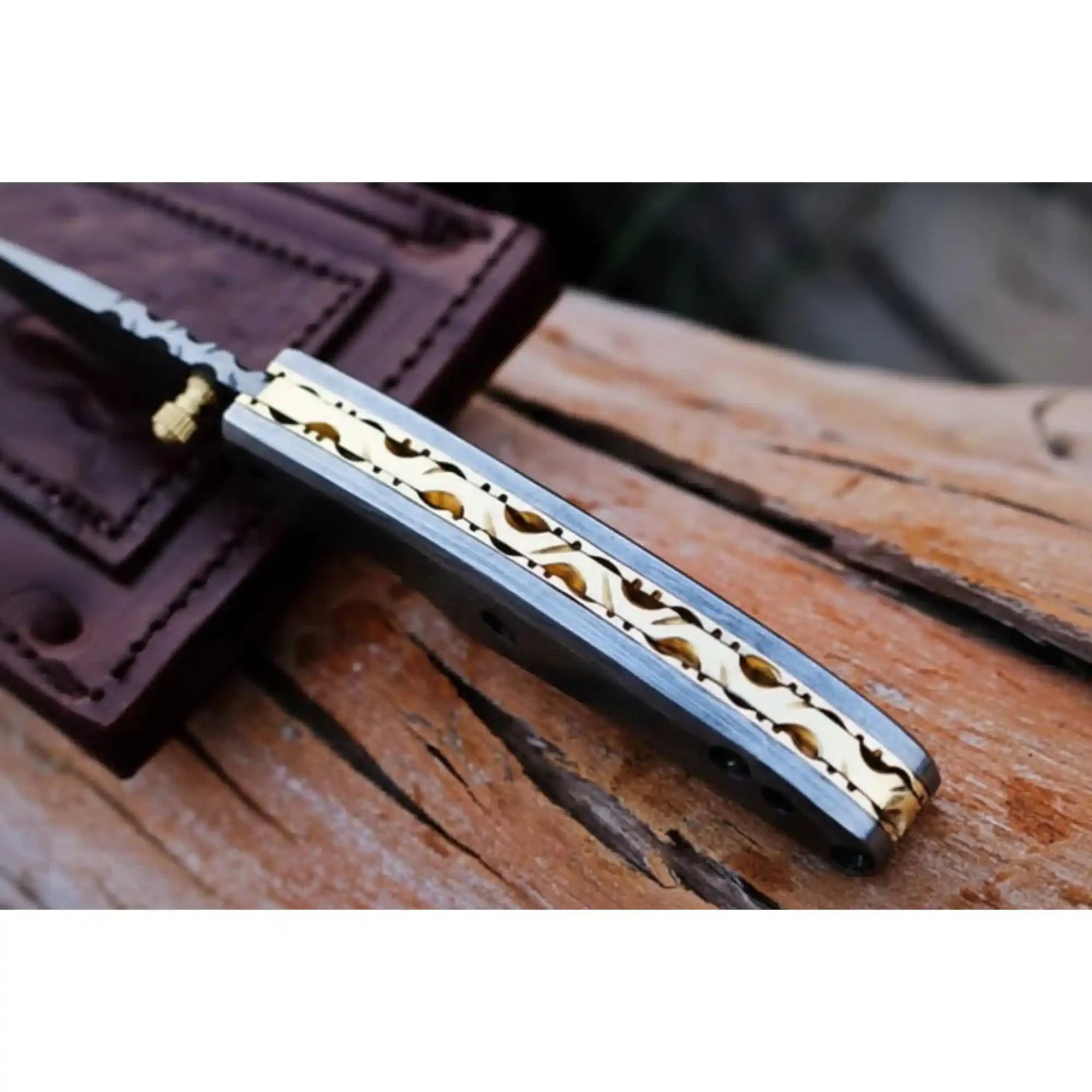 Handmade Damascus Steel Folding Knife with Dark Wood Handle & Leather Sheath
